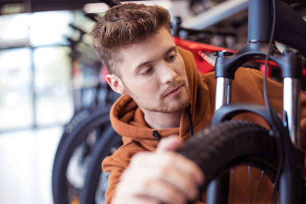 istock Male customer in bicycle shop 1935003606