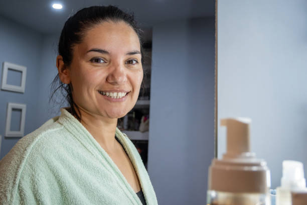 istock Natural Latin woman laughs in front of her dressing table. 1935014130