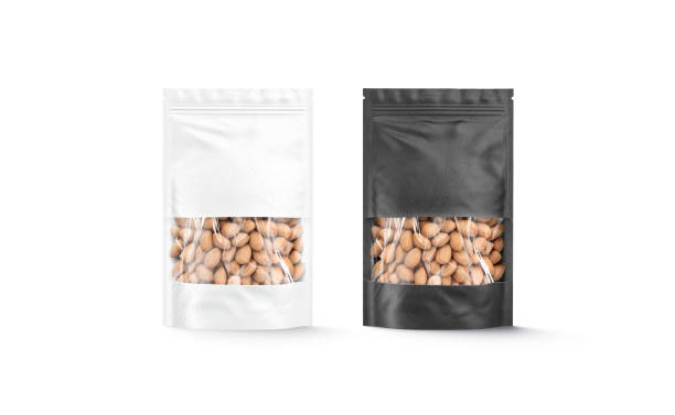 istock Blank black and white zipper pouch with nuts mockup, isolated 1935044000