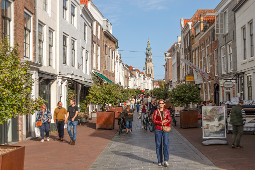 Middelburg, Netherlands, October 7, 2023; People walk through a shopping street in the center of the city of Middelburg in Zeeland.