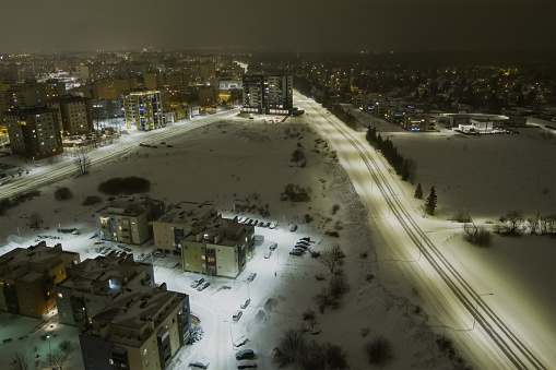 Night drone air photography of the city of Tallinn, Lasnamae district in winter, photo with low light. High quality photo