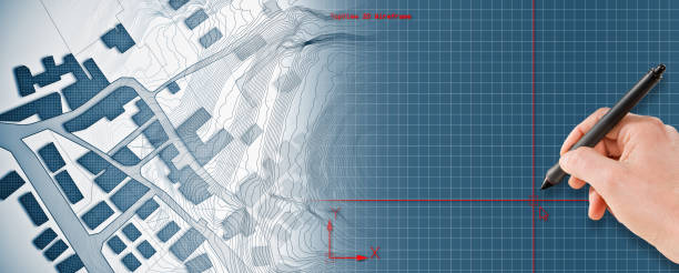 istock Imaginary cadastral map of territory with buildings and roads drawn with a CAD (Computer-Aided-Design) computer software in dwg format file - concept with hand and digital pen 1935097282