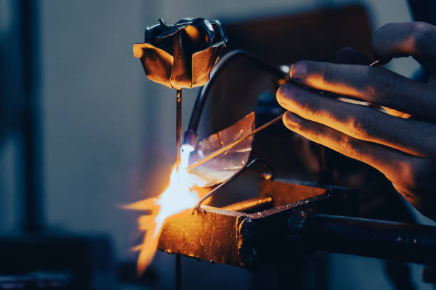 istock A craftsman welding a metal rose 1935124759