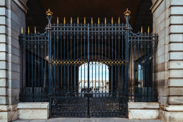 Madrid, Spain - January 11, 2019: Royal Palace of Madrid, Spain. Iron gate