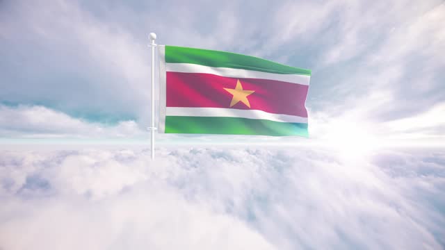 Suriname flag waving above the clouds in slow motion, The concept of liberty, patriotism, independence day, celebration, patriotic, power. National flag waving proudly above the clouds and symbolizing freedom,