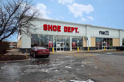 Rome, New York - Nov 21, 2023: Close-up of Shoe Dept. storefront, an American footwear retailer based in Concord, North Carolina and has 63 years of experience. Shoe Dept. is owned by Shoe Show, Inc.
