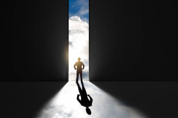 istock Businessman standing in front of open door 1935194126