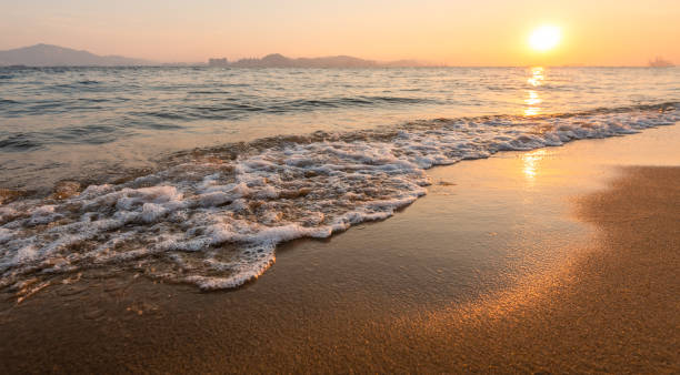 istock Beautiful beach at the sunset 1935199479