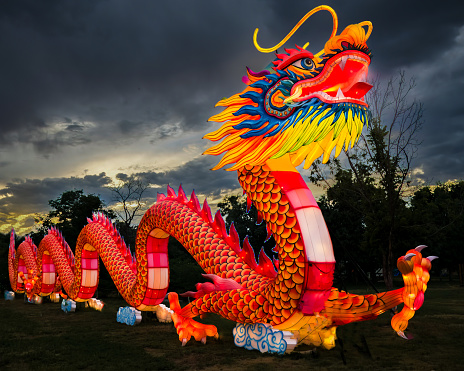 Denver Colorado, “Bright Nights Festival” at Four Mile Historic Park.  8/11/2023.   Traditional Chinese paper lantern sculptures lighting up the park.