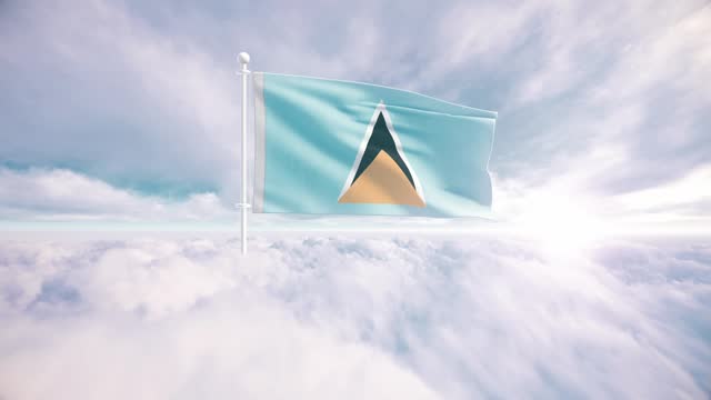 Saint Lucia flag waving above the clouds in slow motion, The concept of liberty, patriotism, independence day, celebration, patriotic, power. National flag waving proudly above the clouds and symbolizing freedom,