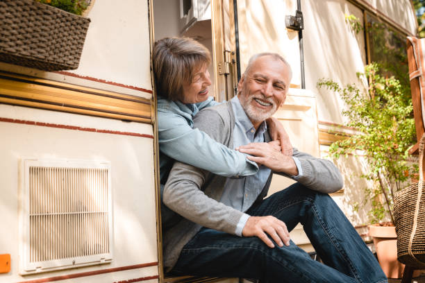 istock Happy couple hugging embracing cuddling together while on a trip adventure 1935253284