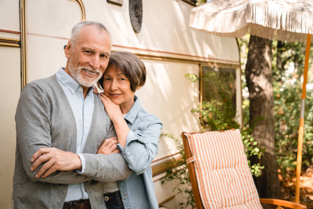istock Confident spouses hugging embracing looking at camera while traveling 1935273518