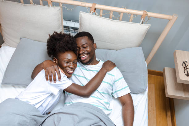 istock Beautiful young couple sleeping in bed 1935274570