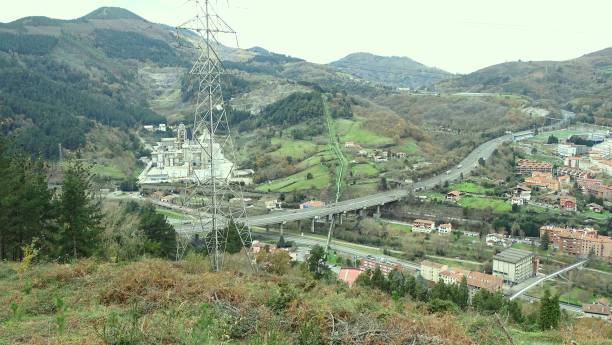 istock Small town next to a large cement plant 1935283061