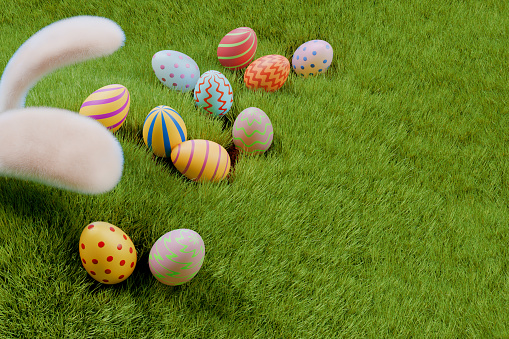 A rabbit hunts for Easter eggs in a meadow in the grass. Top view 3D rendering