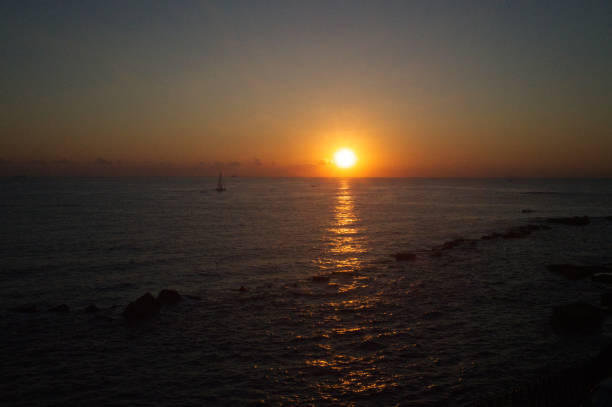 Rising sun and sailboat, Oritigia, Siracusa, Sicily