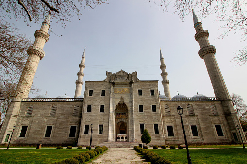 Istanbul, Turkey - April 17, 2021: Photo of the Suleymaniye Mosque with four thin minarets against a stormy sky