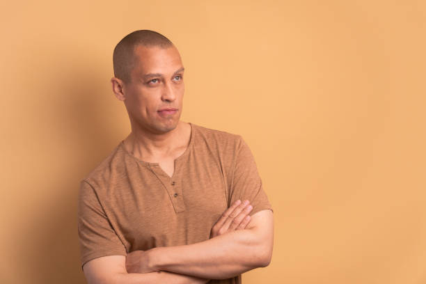 istock annoyed man with arms crossed 1935370384