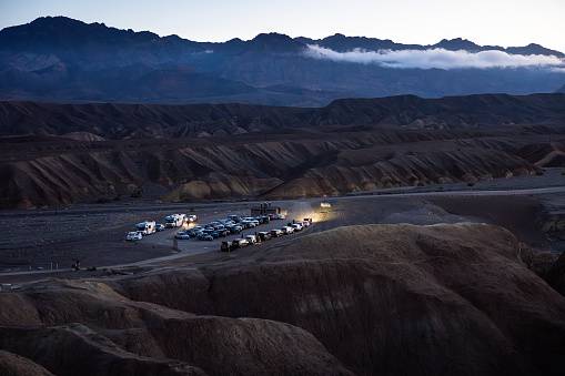 Arriving at Zabriskie Point in Death Valley, the visitor parking lot serves as the gateway to breathtaking vistas. Prepare for awe-inspiring views as you step out from your vehicle into the heart of this extraordinary desert landscape
