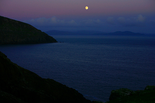 Full moon in Slea Head Drive on Dingle Peninsula, county Kerry, Ireland