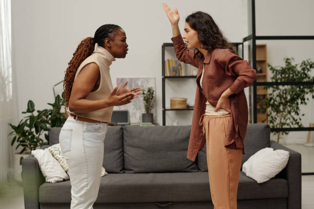 istock Angry girls shouting at one another 1935389960