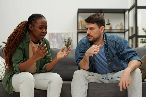 istock Annoyed woman explaining something 1935390494