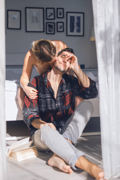 istock Happy Young Couple Relaxed At Home. 1935410945