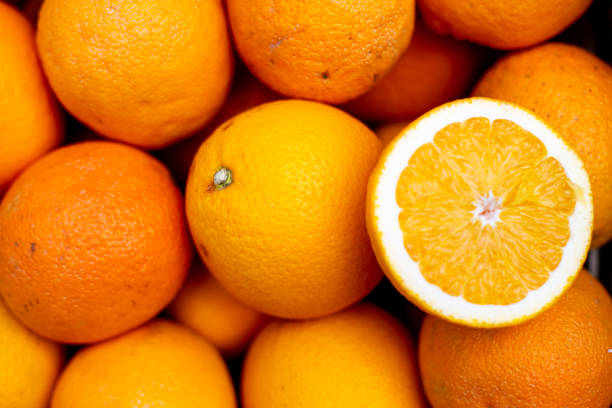 istock a lemon cut in half is sitting among other citruss 1935439150