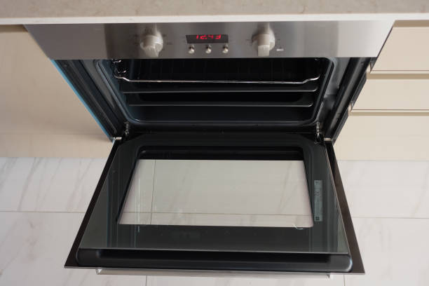 istock open electric oven at home 1935460217