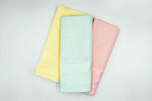 Set of clean napkins, non-marking cleaning cloth. Kitchen towel or table cloth on white background