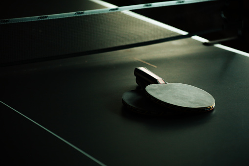 Ping Pong Paddles on Ping Pong Table