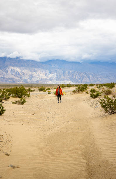 istock Woman amidst Death Valley's beauty 1935552954