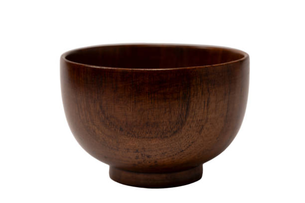 istock Empty wooden bowl isolated on a white background. 1935564384