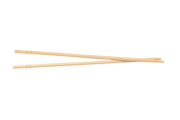 istock Sushi chopsticks isolated on a white background. 1935564398