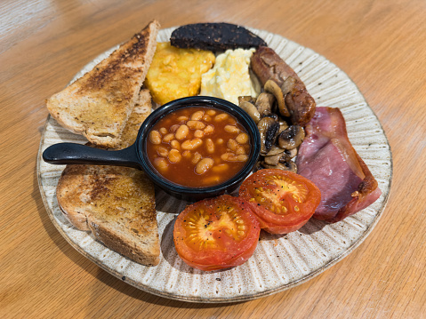 Traditional full English breakfast with scrambled eggs