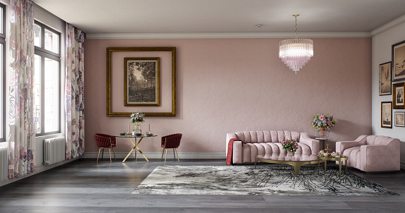 Digitally generated fancy/elegant living room that boasts a serene and sophisticated décor, featuring a plush pink sofa set against a soft pastel wall. A classic chandelier hanging from the ceiling adds a touch of luxury, while a small round table with a vase of fresh flowers provides a cozy ambiance. Sunlight streams through the floor-to-ceiling window, illuminating the dark wooden floor and highlighting the intricate area rug.\n\nThe scene was created in Autodesk® 3ds Max 2024 with V-Ray 6 and rendered with photorealistic shaders and lighting in Chaos® Vantage with some post-production added.