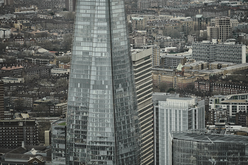 The Shard & The London Bridge railway station from the Bishopsgate, The City of London, England, United Kingdom, Great Britain, Europe - 08th of January, 2024: The Panoramic View Of London City - An Elevated Cityscape View Over London City Skyline at sunset.