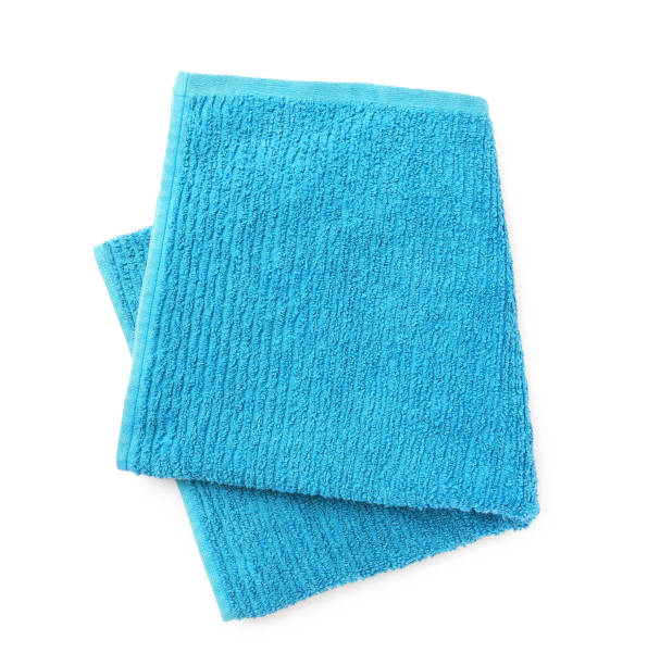 istock Soft blue terry towel isolated on white, top view 1935645066