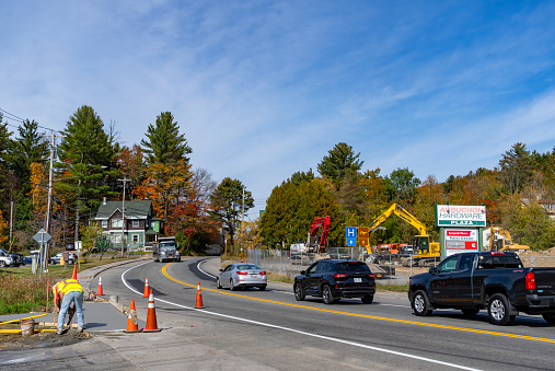 Road works in Lake Placid Town, Mirror Lake, Lake Placid, New York State, USA.
