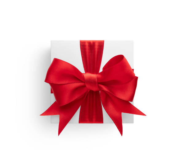 istock Gift box with red ribbon isolated on white background 1935656492
