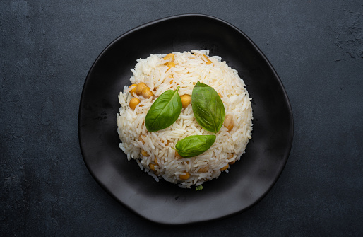 Basmati rice with chickpea and basil leaves