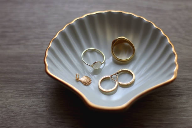 istock Ring Dish and Gold Jewelry 1935755475