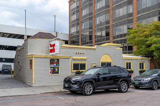 Burlington, Vermont, USA – October, 2023. A Denny's diner in Burlington, Vermont, USA, with cars parked outside.