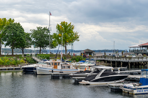 A view of Acton Cove on Spa Creak, as seen from President Point in Annapolis Maryland. The iconic dome of the Maryland State House, home of the state legislature, is seen in the background.