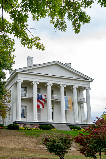 Burlington, Vermont, USA – October, 2023. A white columned building in Burlington, Vermont, USA.