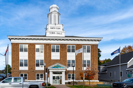 Lake Placid, New York State, USA – October, 2023. North Elba Town Hall in Lake Placid Town, Mirror Lake, Lake Placid, New York State, USA.