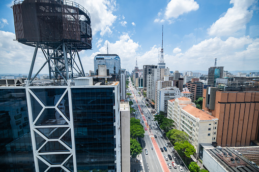 View of the skyline of São Paulo, Brazil from the SESC Avenida Paulista biuilding on a partly cloudy day
