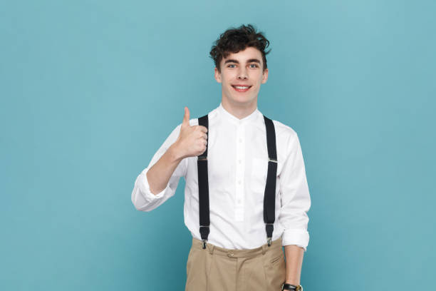 istock Positive optimistic attractive man standing showing thumb up, like and recommend service. 1935867227