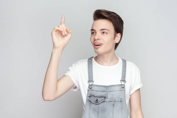 istock Clever man scientist get new idea, raises fore finger, ready to start work on project. 1935907584