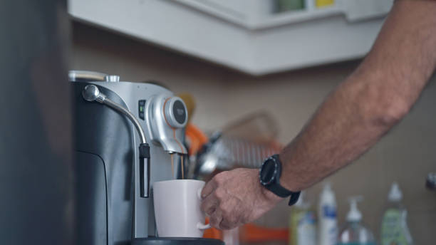 istock Man making coffee. Day in the life. 1935984933